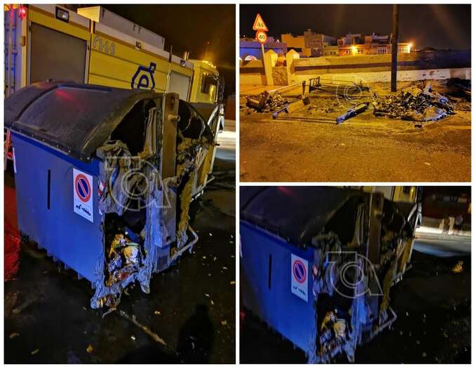 Contenedores quemados y dañados en el incendio intencionado/TA.